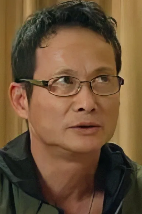 Profile photo of Chris Lee Kin-Sang