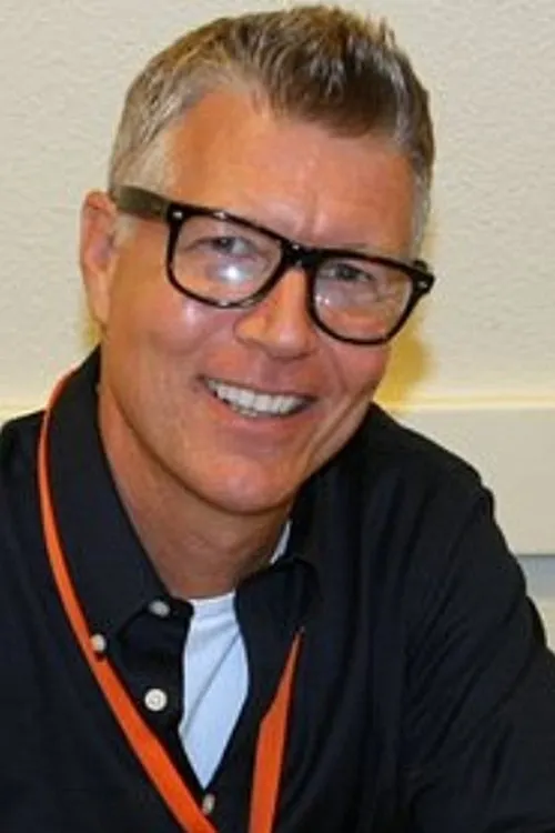 Profile photo of John Michael Graham