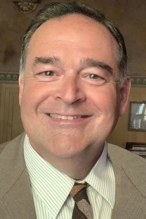 Profile photo of Nick Logan